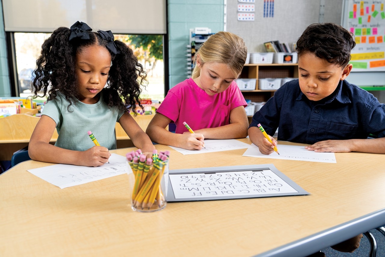 kids using small pencils