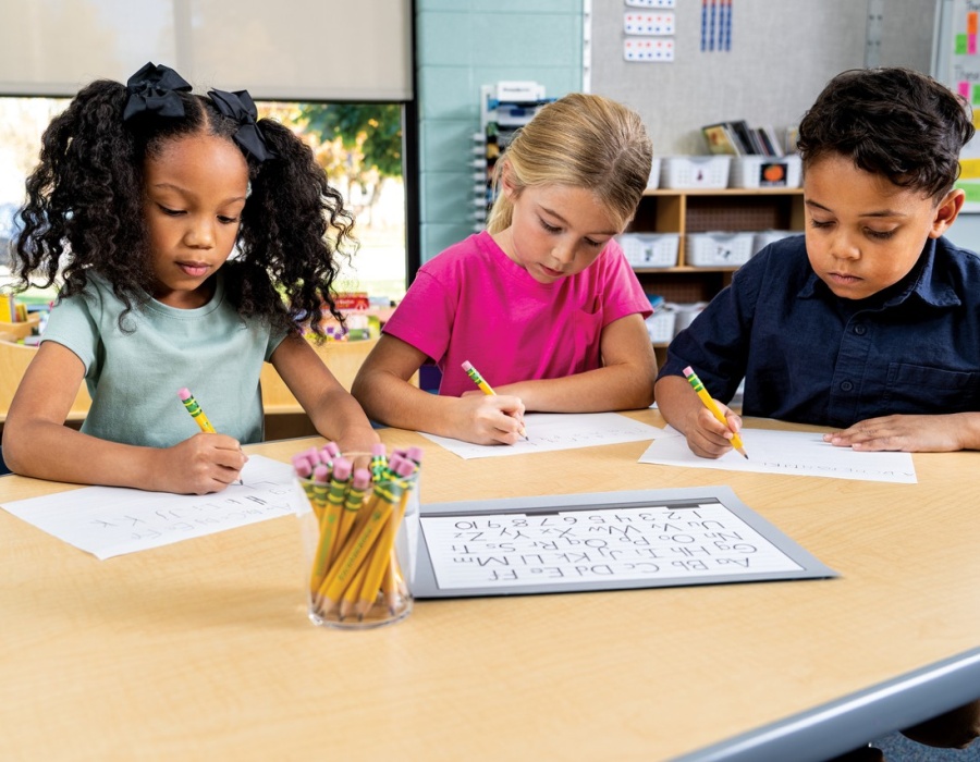 kids using small pencils